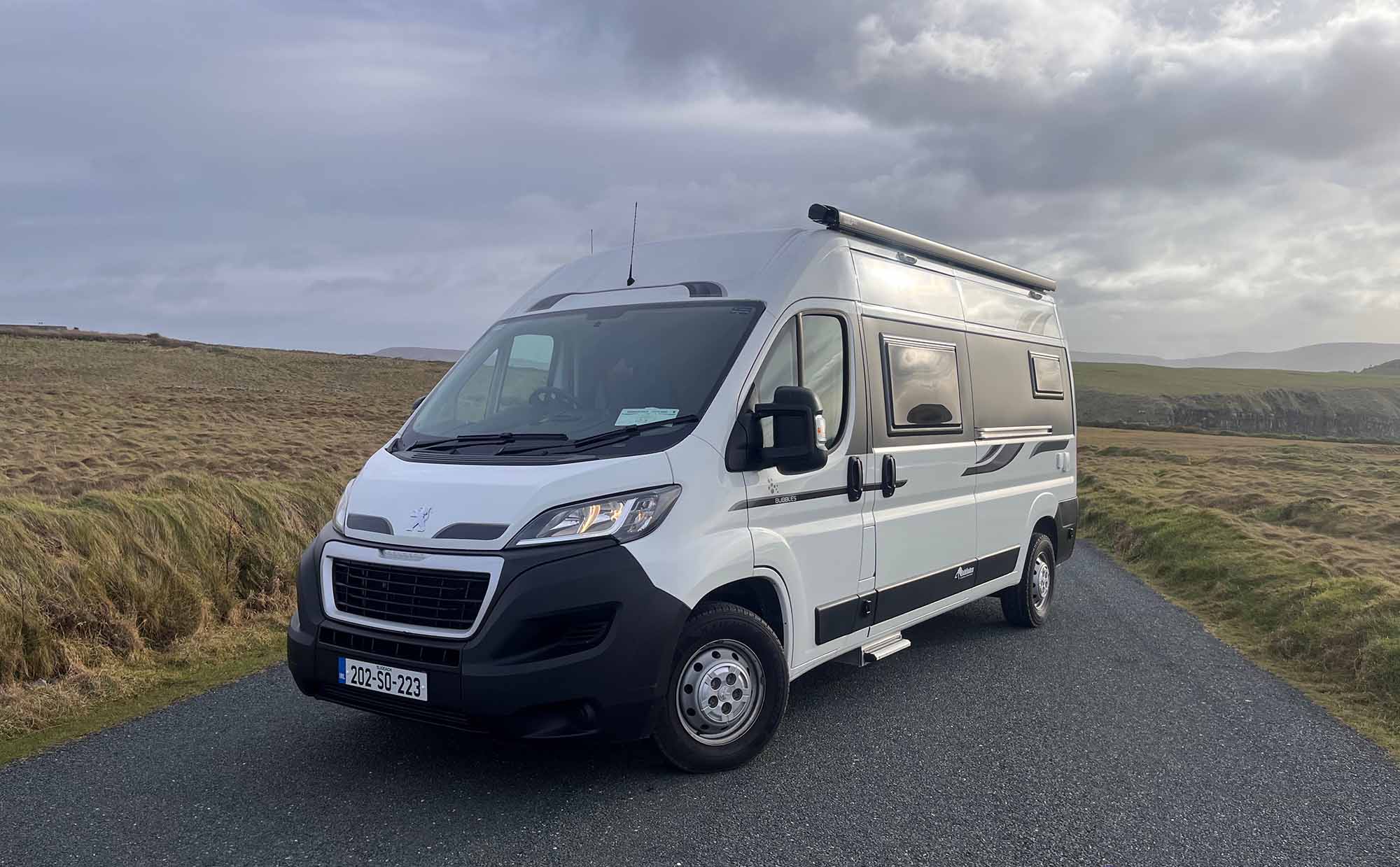 front and side view of white van