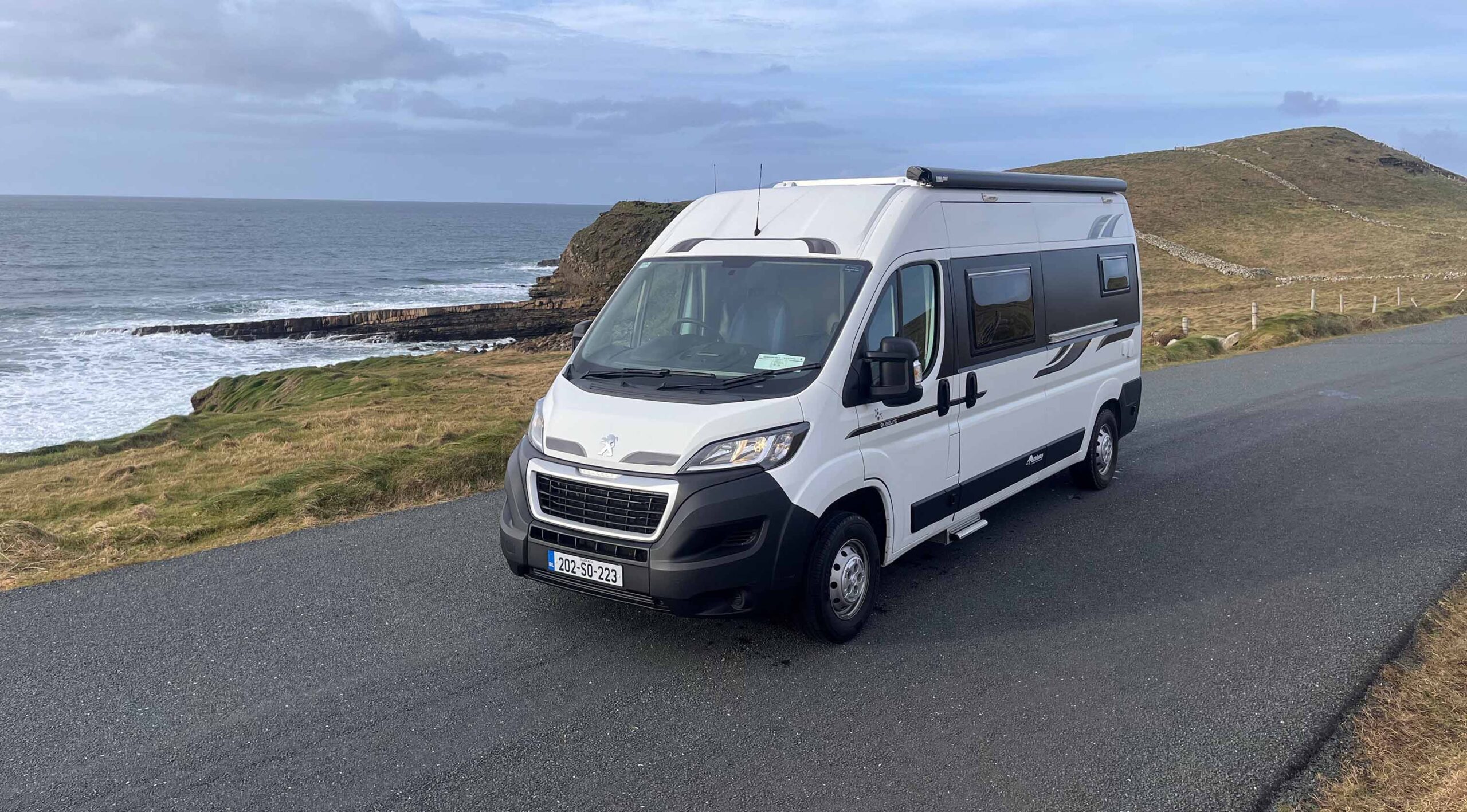 front side view of white van